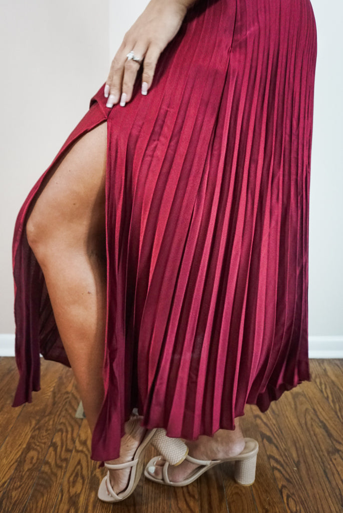 Pleated Red Skirt With A Slit