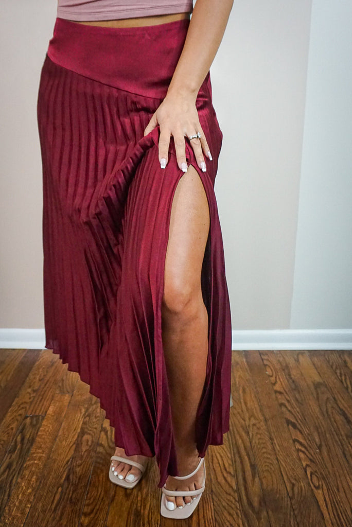 Pleated Red Skirt With A Slit