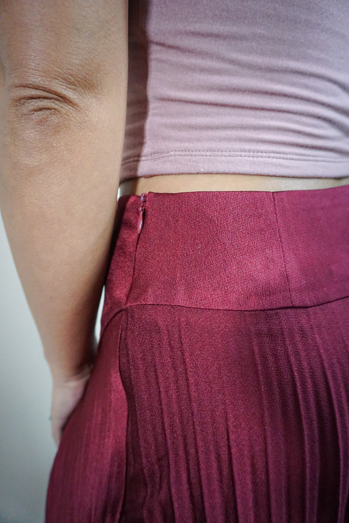 Pleated Red Skirt With A Slit